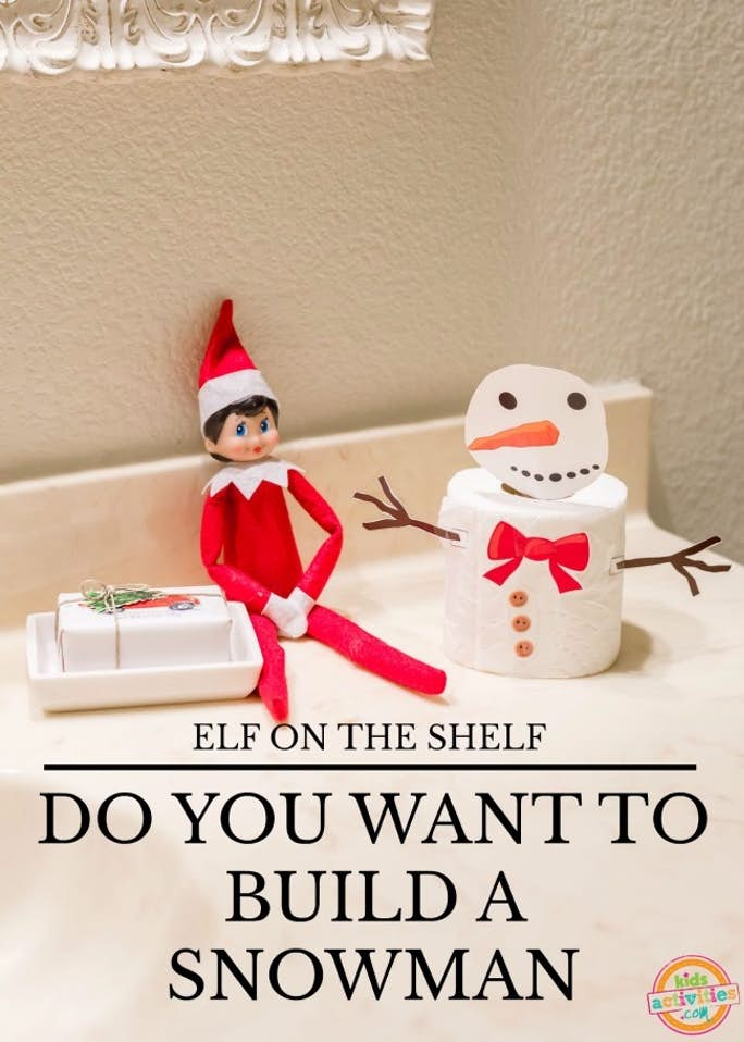 စင်ပေါ်ရှိ Elf အိမ်သာစက္ကူ Snowman ခရစ္စမတ်စိတ်ကူး